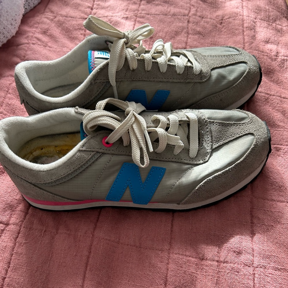 Gray New Balance 556 Retro Sneakers with Blue and Pink Accents